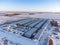 Drone view of a rental storage unit facility with closed bay doors.