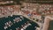 Drone view of the rooftops of the houses in the Lustica bay marina