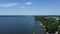 Drone view of the shoreline with piers at Sandbanks Provincial Park, Canada
