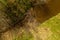 Drone view of small beaver dams on a river during summer days