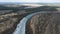 Drone view on spring thaw and Desna river in Ukraine. Bird`s eye view of the river in ice in early spring.