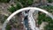 Drone view of a steel bridge crossing a wonderful river