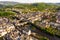 Drone view of summer cityscape of Espalion on Lot river, France