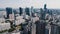 Drone view of tall apartment buildings and skyscrapers in the center of Warsaw Poland. Modern cityscape in the day