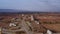 Drone view of a transportation road passing through a rural area in Islamabad, Pakistan