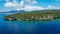 Drone view of a tropical Menjangan island and corral reef in the Indian Ocean. The concept of a paradise vacation