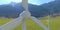 A drone view of a wind turbine installed in the forested mountains of the eastern Alps. Clean renewable energy available even at