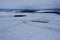 Drone view of winter snowy farmland