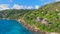 Drone viewpoint of beautiful Anse La Liberte\\\', Seychelles coastline on a sunny day