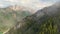 DRONE: White mist hovers over the coniferous woods covering the Julian Alps.