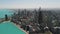 Drone wide footage of Chicago downtown skyline on sunny day.