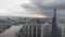 Drones aerial take a beautiful view of the big city from a bird`s eye view with skyscrapers or tall buildings against