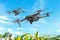 Drones Flying Over field