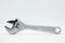 Drop forged adjustable wrench with chrome finish for maximum resistance against corrosion on white background