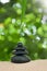 A drop of water drips on the pyramid stone