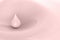 Droplet of pink milk