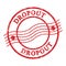 DROPOUT, text written on red postal stamp