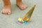Dropped Ice Cream Cone by Child\'s Feet