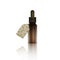A dropper with ylang ylang flower essential oil