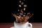 Dropping coffee beans on coffee cup