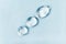 Drops of hyaluron on a blue background medical concept Oxygen filled fluid