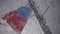 Drops of rain on glass on background of the flag on the mast of yacht.