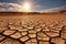 drought affected cracked earth under a harsh sun