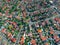 Drown view looking down on sydney residential houses in Sydney suburbia suburban house roof tops and streets NSW Australia