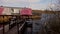 Drowned landing stage on the river. Half gone under water