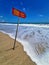 Drowning hazard sign on the beach in Porto de Galinhas, Pernambuco, Brazil