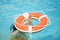 Drowning person. Water rescue emergency equipment. Rescue ring.