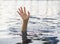 Drowning victims, Hand of drowning woman needing help.