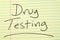 Drug Testing On A Yellow Legal Pad