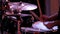 Drum set. Close-up of the hands of a drummer beating sticks on cymbals of an drum kit. Concert performance of a rock band, jazz ba