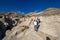 Drumheller Hoodoos, Alberta Canada - September 23, 2021: Tourists walking on the Hoodoos on a sunny day in September