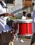 Drummer Playing Red Snare Drums in Parade