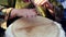 Drummers hands on an african djembe drum musical instrument ethnic beat Close up