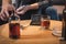 drunk, depressed man sitting with bottle