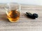 Drunk driving concept. Glass with whiskey and car key on the table.