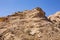 Dry, arid limestone mountains in the Valley of the Caves in Mleiha Archaeological Centre in Sharjah, UAE