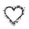 Dry black earth for planting domestic plants and seedlings in the shape of a heart.
