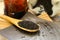 Dry Black tea on a wooden spoon