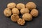 Dry brown nutmeg on grey stone