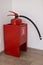 Dry chemical powder fire extinguisher in corridor