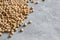 Dry chickpeas close-up on a gray background