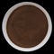 Dry coffee sediment on a round plate