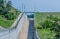 Dry concrete spillway on rural hillside