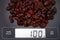 Dry cranberries on digital scale