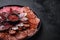 Dry cured sausage sliced chorizo, fuet, salami on balck background with copy space
