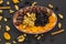 Dry Date Fruits,Apricot,Walnuts and Black Grapes in the oval plate